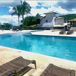 Casa Em Condominio De Alto Padrao-Buzios- Localizada No Melhor Bairro-Geriba-4 Quartos Sendo 3 Suites-Ar Cond Em Todos Os Quartos-4 Banheiros-Churrasqueira-Piscina-Sauna-Tv Sky-Internet-16 Hospedes